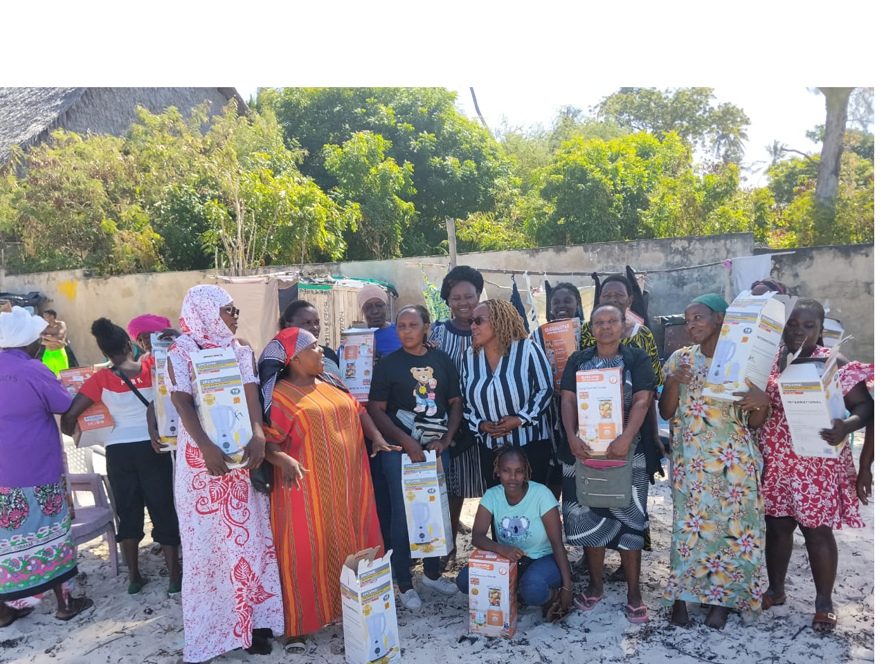 Women receiving blender donations